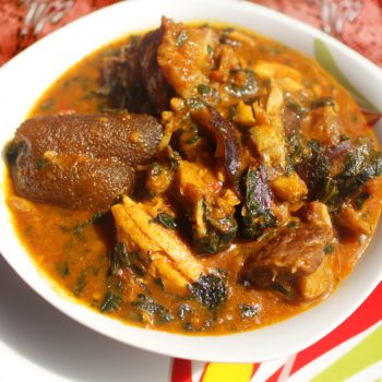 Close up of a bowl of ogbono soup. This is a popular Nigerian dish usually served with other foods to swallow. It contains beef, dried fish, chopped meat pieces, kpomo and little vegetable Close up of a bowl of ogbono soup. This is a popular Nigerian dish usually served with other foods to swallow. It contains beef, dried fish, chopped meat pieces, kpomo and little vegetable